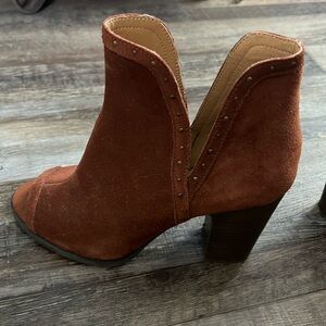 Rust colored Lucky open toe booties.